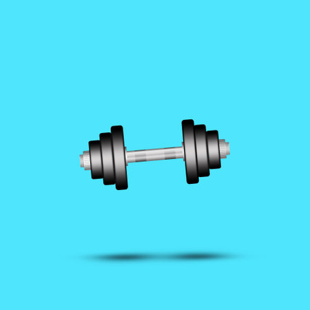 Dumbbell on a blue background. Shadow. Copy space. Place for text. Sports equipment, gym, fitness. Sports background.の写真素材