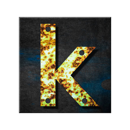 Letter k. Lower case. Alphabet from letters, from rusty iron, on a wooden plank. Isolated on white background. Education. Design element.の写真素材