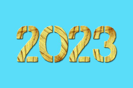 2023. Wooden numbers, on a blue background. Holidays Background