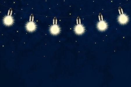 Glowing retro garland on the background of the starry sky. copy space. Festive background. Christmas, New Year background Background.の写真素材