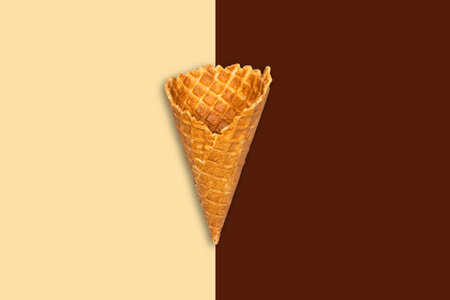 Ice cream cone on a chocolate beige background. Summer holiday concept. Food. Dessert.の写真素材