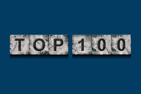 Top 100, words, on a dark blue background. Alphabet on stone blocks.Rating. Rating concept.