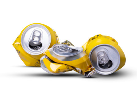 Crumpled aluminum cans. Isolated on white background. Shadow. Recycling. Reuse Beverages Ecologyの写真素材