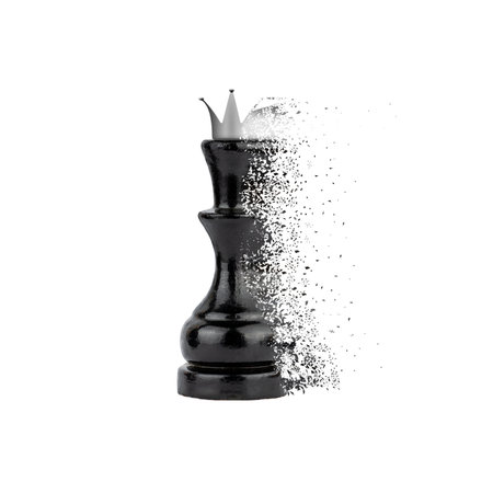 Disintegrating figure of black chess queen isolated on white background.Defeat. Failure. Losing. Sport. Chess. Designの写真素材