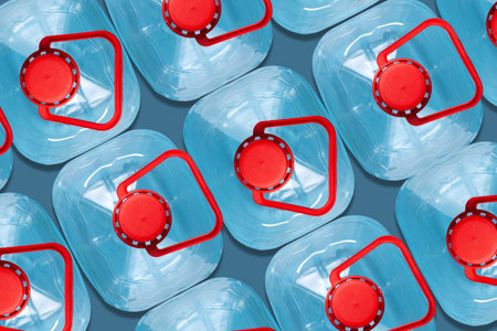 Lot plastic bottles. Top view. Big bottle. Products, packaging storage recycling Backgroundの写真素材