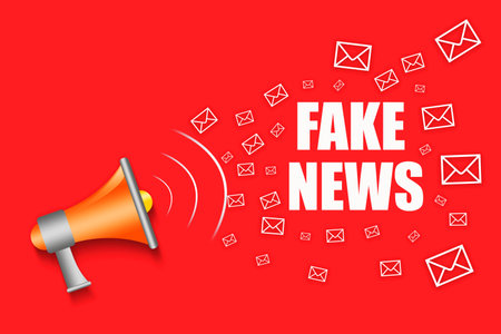 Fake news. Megaphone and envelope icons on red background. Concept of false information. Business, lifestyle.の写真素材