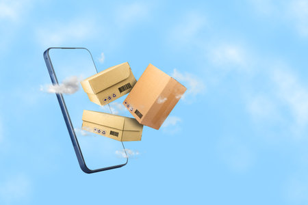 Delivery concept. Cardboard boxes and smartphone on a blue cloudy sky. Background for companies transporting and delivering goods. Business background.の写真素材