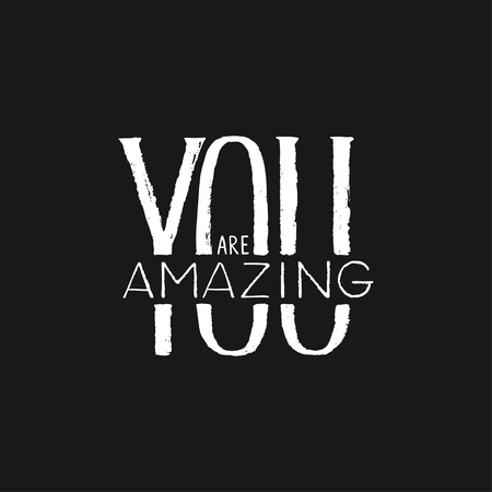 Hand drawn lettering "You are Amazing". Modern brush calligraphy isolated on black backdrop design.のイラスト素材