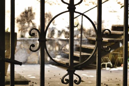 Detail of decorative metal fence with floral Elements, Rovinj, Croatia.の写真素材