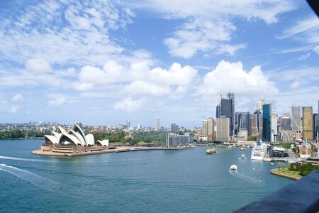 Sydney opera house with ferrys in foreground, view from harbor bridgeのeditorial素材
