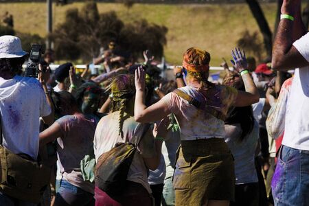St. Kilda, Melbourne, Australia, 23 February 2019 Holi Festival of Colours dancing people