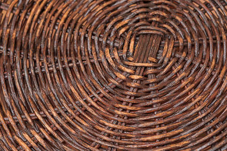 texture intertwined brown twigs bamboo background. table surface.