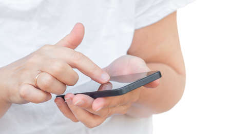 Hand with telephone on a white background. Woman touching phone screen isolate