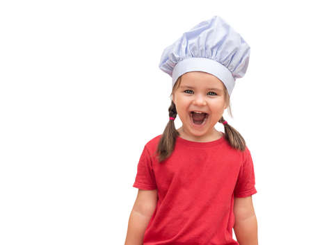 Portrait of a child in a chef's hat isolated on white backgroundの写真素材