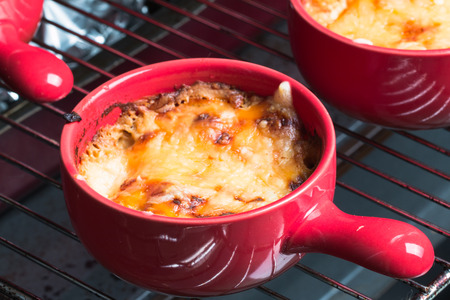 Pictured on the cocotte with julienne in the oven.の写真素材