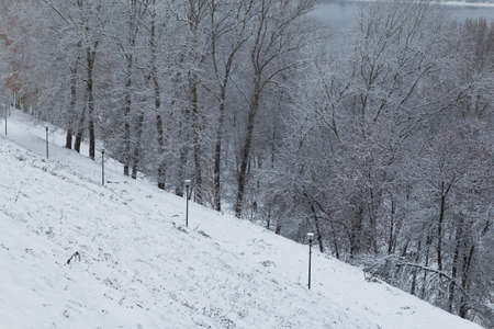 The photo shows the Volga River embankment in winter in the snow in Nizhny Novgorod.の写真素材