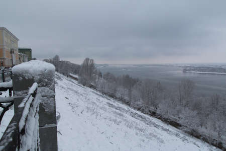 The photo shows the Volga River embankment in winter in the snow in Nizhny Novgorod.の写真素材