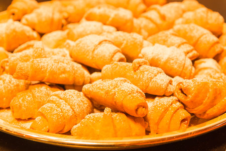 In the photo you can see fresh homemade jelly cookies sprinkled with icing sugar.の写真素材