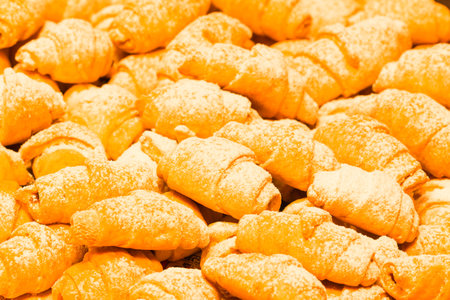 In the photo you can see fresh homemade jelly cookies sprinkled with icing sugar.の写真素材