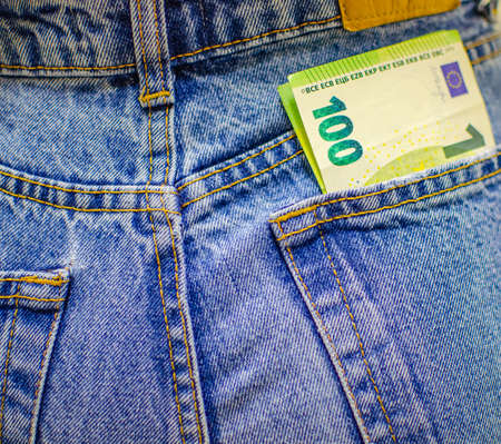 hundred euros in jeans pocketの写真素材