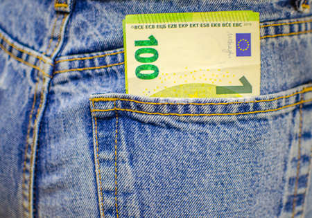 hundred euros in jeans pocketの写真素材