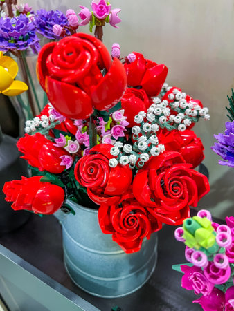 Prague, Czech Republic - April 22, 2024: Lego constructor red plastic roses The Botanical Collection in a vaseのeditorial素材