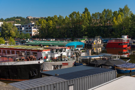 Prague, Czech Republic - September 20, 2024: Boats docked in Holesovice, after flood threatのeditorial素材