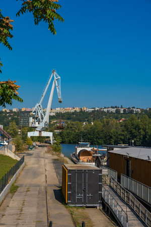 Prague, Czech Republic - September 20, 2024: Industrial crane and dockyard in Holesovice