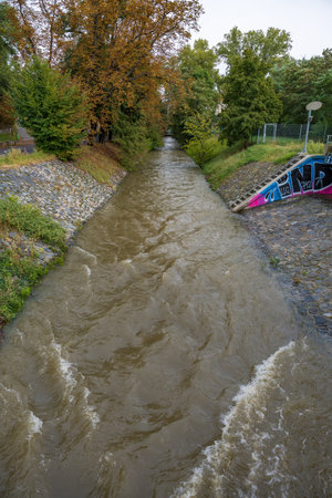 Prague, Czech Republic - September 16, 2024: Rokytka river in the Thomayer Gardens during the floodのeditorial素材
