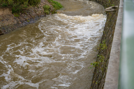 Prague, Czech Republic - September 16, 2024: Rokytka river in Palmovka district during the floodの写真素材
