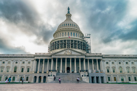 WASHINGTON DC, USA The United States Capitol view from the street. In 2014, scaffolding was erected around the dome for a restoration project scheduled to be completed by 2017.のeditorial素材