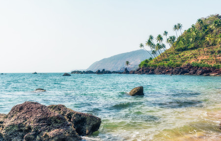 Ocean Beach in summer sunlight. Goa, India. Vivid, splittoned image.の写真素材