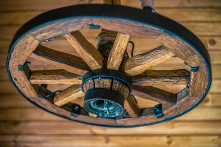 old wheel on the cellarの写真素材