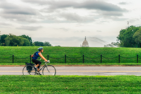 WASHINGTON DC, USA - AUGUST 5, 2016: The United States Capitol view from the street. In 2014, scaffolding was erected around the dome for a restoration project scheduled to be completed by 2017.のeditorial素材