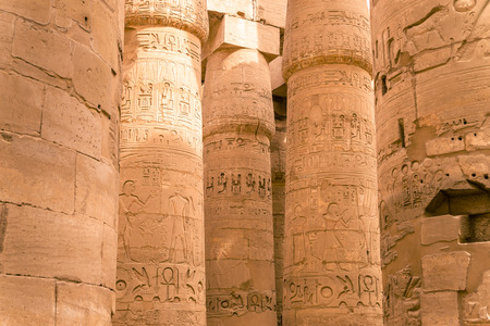 LUXOR, EGYPT: Ancient ruins of Karnak temple in Egypt at noon. The complex is a vast open-air...