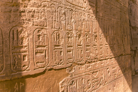 LUXOR, EGYPT: Ancient ruins of Karnak temple in Egypt at noon. The complex is a vast open-air...