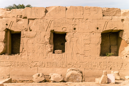 LUXOR, EGYPT: Ancient ruins of Karnak temple in Egypt at noon. The complex is a vast open-air...