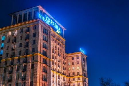 KYIV, UKRAINE - MARCH 23, 2017: Maidan Nezalezhnosti (literally: Independence Square) is the central square of the capital city of Ukraine with people in the night time. Vivid, splittoned image.のeditorial素材