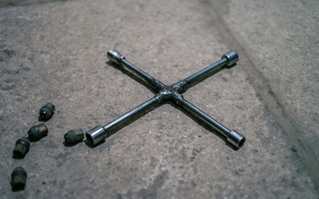 Car service tools on concrete basement. Low light image.の写真素材