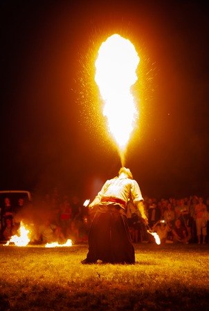 POLTAVA, UKRAINE - JULY 06, 2018: fire show on the open air meeting celebrating old christian traditionのeditorial素材