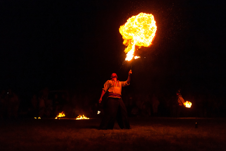 POLTAVA, UKRAINE - JULY 06, 2018: fire show on the open air meeting celebrating old christian traditionのeditorial素材