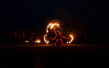 POLTAVA, UKRAINE - JULY 06, 2018: fire show on the open air meeting celebrating old christian...
