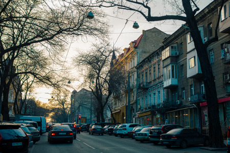 ODESA, UKRAINE - MARCH 05, 2019: evening street view on buildings, cars and peopleのeditorial素材