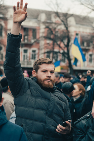 POLTAVA, UKRAINE - MARCH 16, 2019: locals gathering on meeting before president elections in Ukraineのeditorial素材