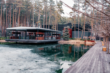 POLTAVA, UKRAINE - MARCH 26, 2019: trees and buildings in local park Verholy at spring timeのeditorial素材