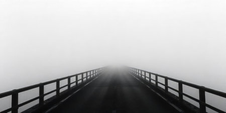 A long bridge stretches out into thick fog, creating an eerie atmosphere. The wooden railing adds depth while obscuring the view ahead, enhancing the mysterious feel of the scene.の素材