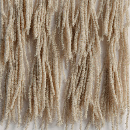 Soft beige strands cascade down, creating a lush texture on the wall. This contemporary design...