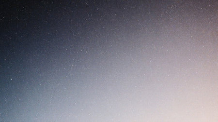 A vast night sky adorned with countless stars creates a serene atmosphere. The gentle gradient from dark blue to soft hues signifies the end of the day, inviting peaceful contemplation.の写真素材