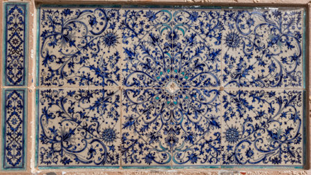 Contains a rectangular tile panel with an intricate, symmetrical design. The tile is predominantly...