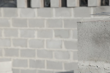 New house construction, building foundation walls using concrete blocks, copy spaceの写真素材